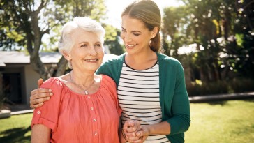 Senior woman with adult daughter caregiver